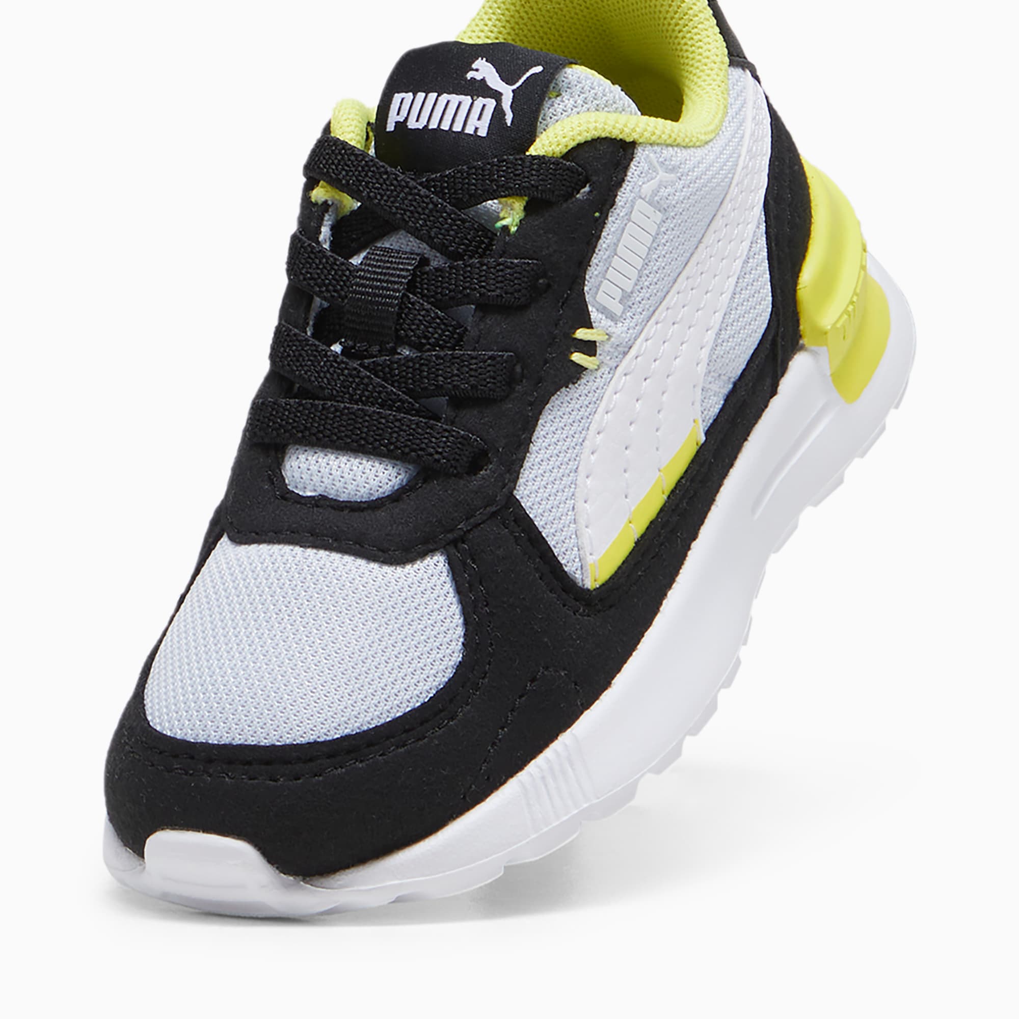 PUMA Graviton AC sportschoenen, Groen/Zwart/Wit